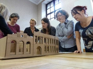 GWL staff explore a model of the Bridgeton Library