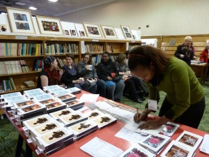 Women discuss their books at the World Book Night event in 2011