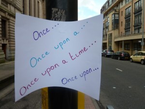 Image of words on lamp post (once upon a time)