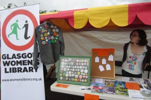 Image of the stall and the display of the badges from the archive. 