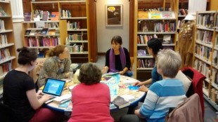 Some of us who worked on the Commonwealth project. And some of the books we've collected on the shelves behind us.