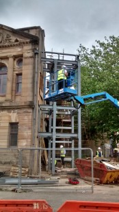 The steelwork being installed for the lift