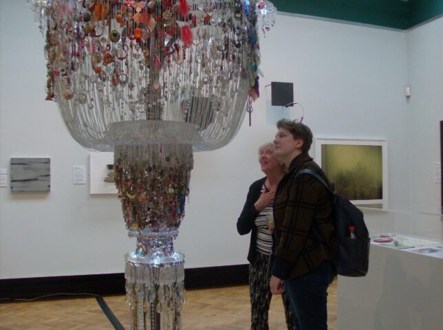 Alice and Laine looking at the Chandelier of Lost Earrings, Lauren Sagar (Credit: Mary Alice)