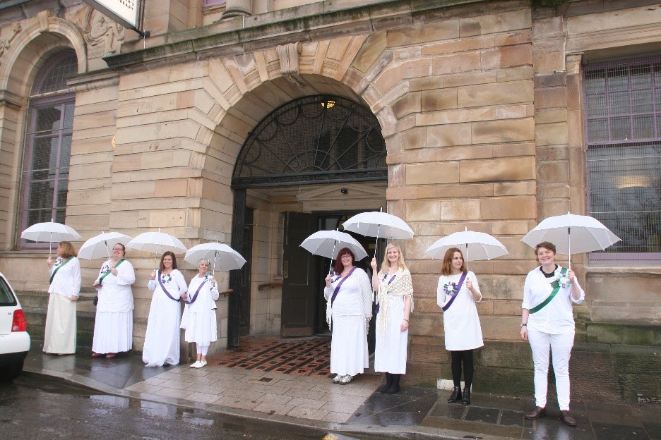 GWL staff welcoming visitors to March of Women