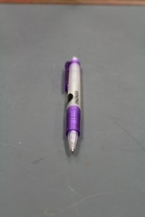 photograph of a purple-transparent pen