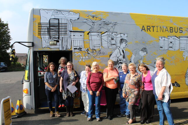 Annan's women's group in front of the Travelling Gallery bus