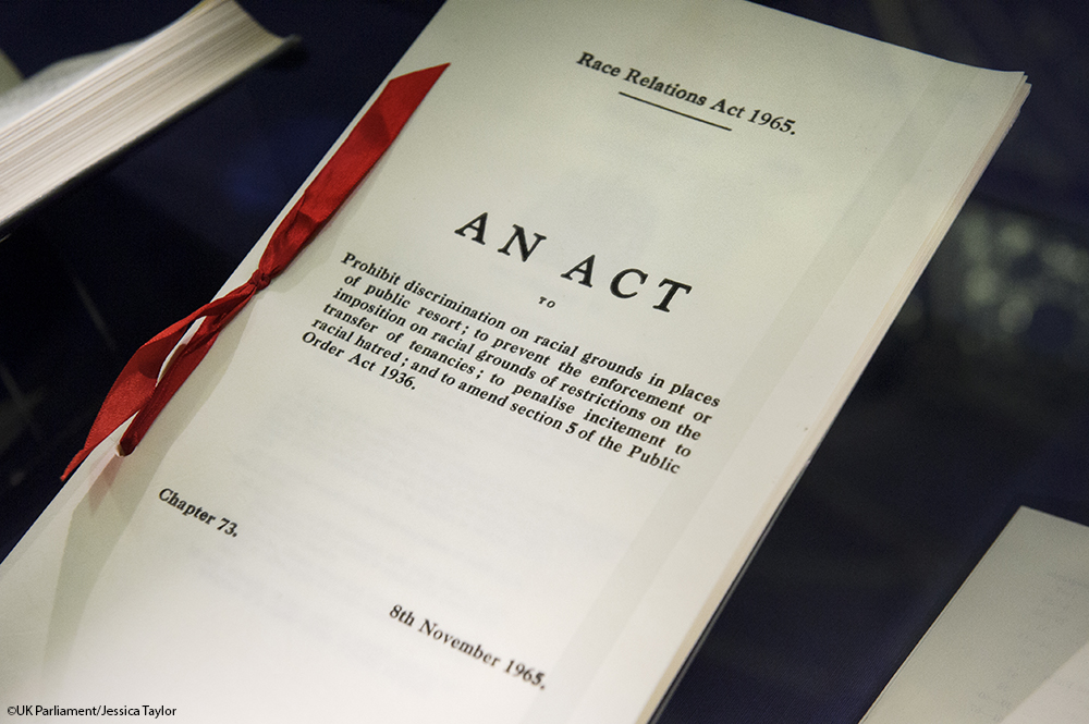 Bound paper showing the words 'An Act' on the cover.