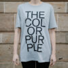 Grey t-shirt emblazoned with 'The Color Purple'