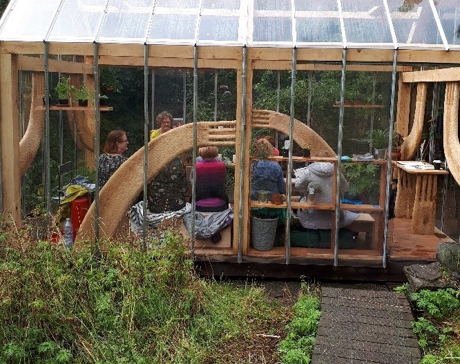 Women’s group at the Palm House Secret Garden. Credit: GWL