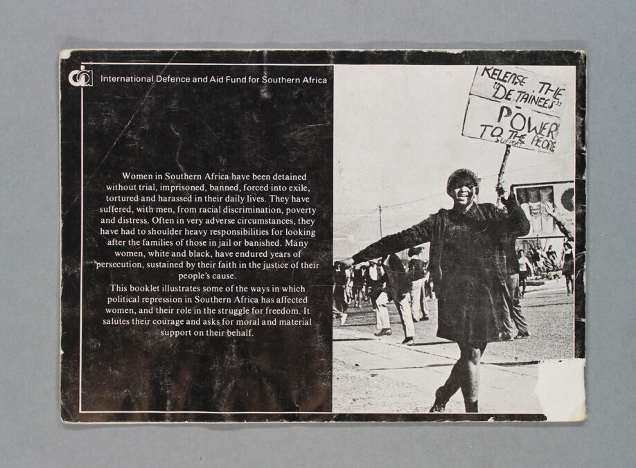 Back cover of 'You Have Struck a Rock' pamphlet, featuring a photogrpah of a woman holding a protest sign that reads 'Releasse the "Detainees" / Power to the People'