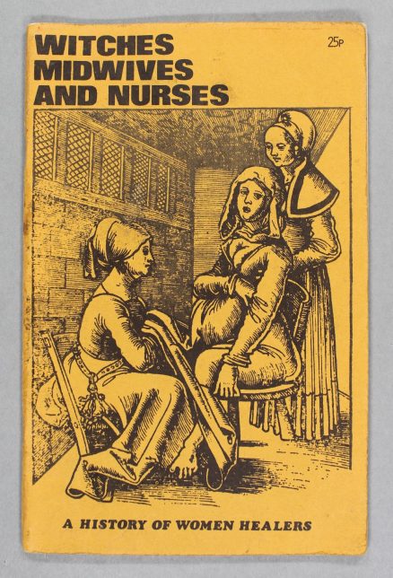 A yellow book with a black and white illustration showing a woman tending to a woman who is pregnant. At the bottom it says, "A history of women healers".