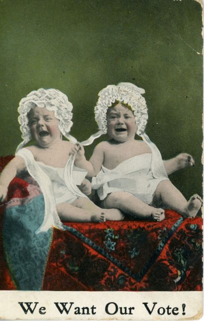 Anti-suffragette postcard of two infants in lace bonnets heartily bawling, with the caption "We want our vote!"