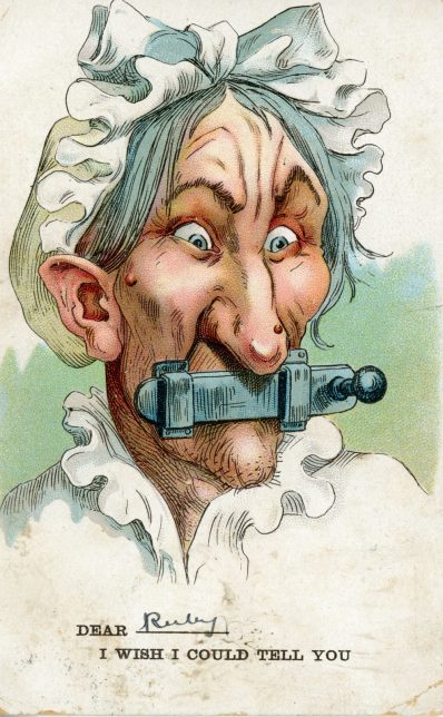 Postcard with an illustration of an old woman with a bolt shot across her lips. Caption: "Dear [here there is a space to fill in the name of your choice, in this instance:] Ruby, I wish I could tell you".