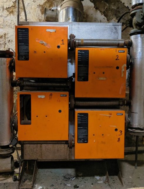 The old boiler! It looks like four orange boxes arranged two on top the other.
