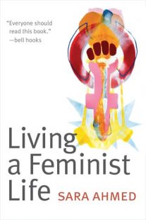 Cover of Living a Feminist Life by Sarah Ahmed (The cover features a watercolour rendering of the woman power symbol, combining the symbol for Venus and an upheld fist, in rich pink and yellow tones on a white background. The title is in grey, and there's a quote from bell hooks 'Everyone should read this book'))