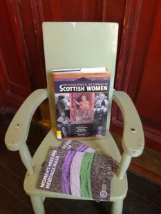 Dictionary of Scottish women sitting on a small chair.
