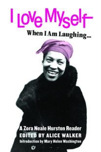 Black and white image of the author laughing. She is wearing a pink headscarf. The title is in pink letter on a white background