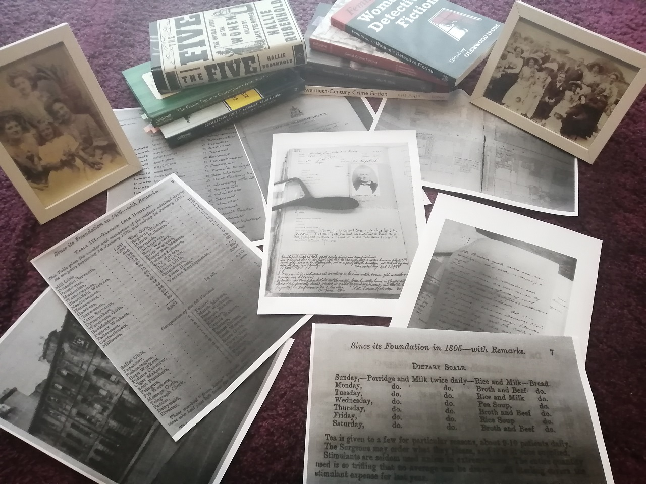 Research Materials for the historical crime fiction novellas. Credit: Donna Moore. Includes photographs, books and scanned pages.