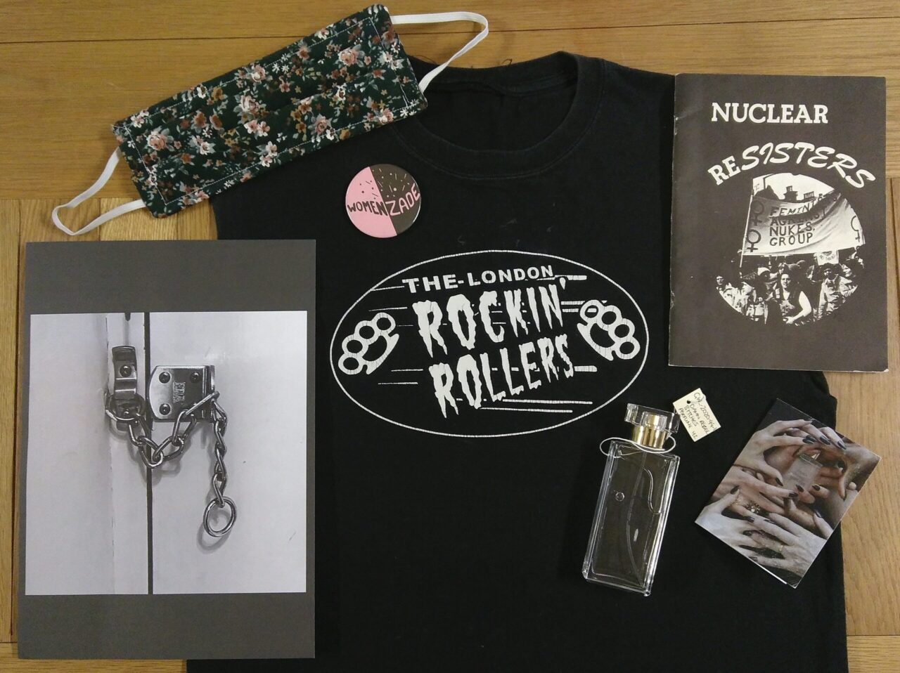A selection of the materials gifted to GWL during the COVID-19 lockdown including a face mask and a black Rockin Rollers t-shirt.