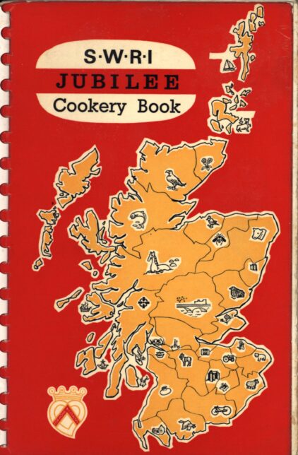 A red book cover with an orange map of Scotland, the book is titled "S.W.R.I JUBILEE Cookery Book"