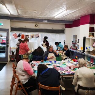 Women from the Making Her mark project participating in creative and research workshops