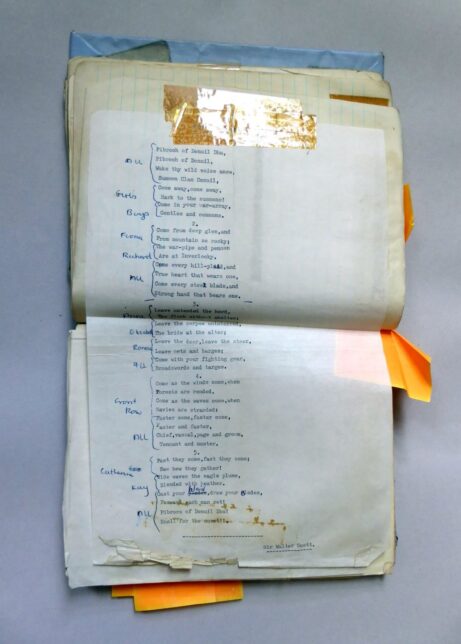 Typed choral verse stuck with Sellotape into a lined notebook