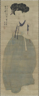 Full body portrait of a Gisaeng. Her hair is up and her skirt is light blue.