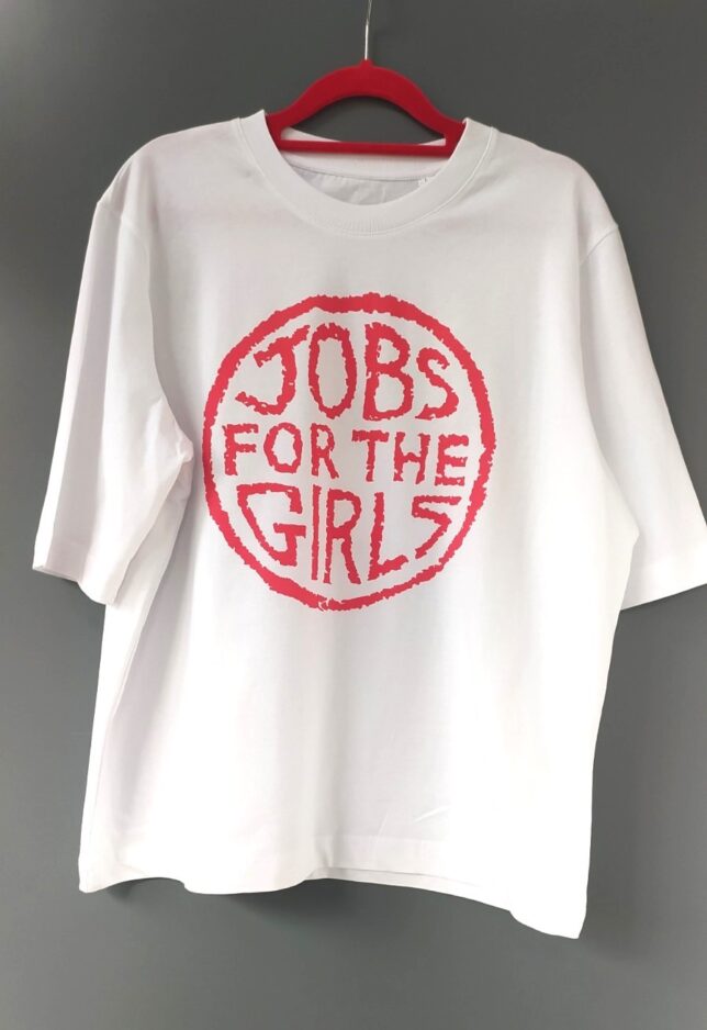 White T-shirt with 'Jobs for the girls' in red capitals within a red circle