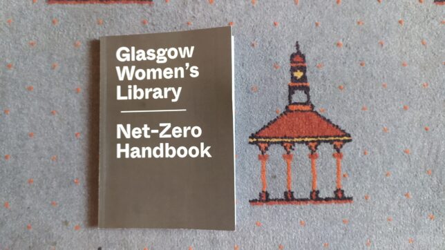 A copy of GWL's Net-Zero Handbook lying on the library's 'Bridgeton Umbrella' carpet