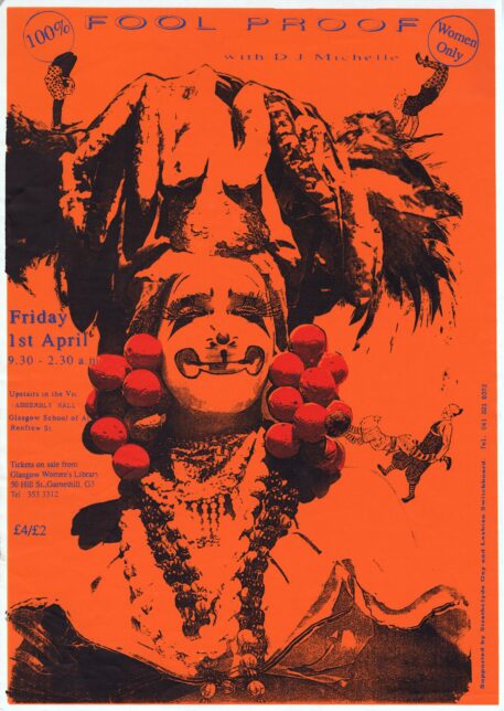 The poster is printed in full colour ink on white paper. It says ‘100% Fool Proof’ at the top in blue font, but the poster is predominantly orange. It features a figure in greyscale (colourised to match the orange background), who is wearing clown-like face paint and a large, flamboyant headdress.