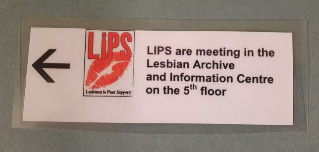 A sign which reads "LiPS are meeting in the Lesbian Archive and Information Centre on the 5th floor. With an arrow pointing left.