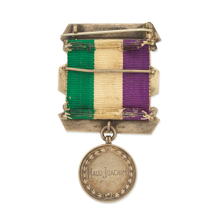 Hunger Strike Medal, awarded by the WSPU to Maud Joachim, 1912. Image shows the back of the medal