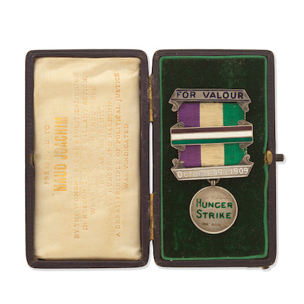 Maud Joachim’s medal in its original purple box with green velvet lining, and the wording on the inside lid, printed in gold on white silk, reads: “Presented to Maud Joachim by the Women’s Social and Political Union in recognition of a gallant action, whereby through endurance to the last extremity of hunger and hardship a great principle of political justice was vindicated”