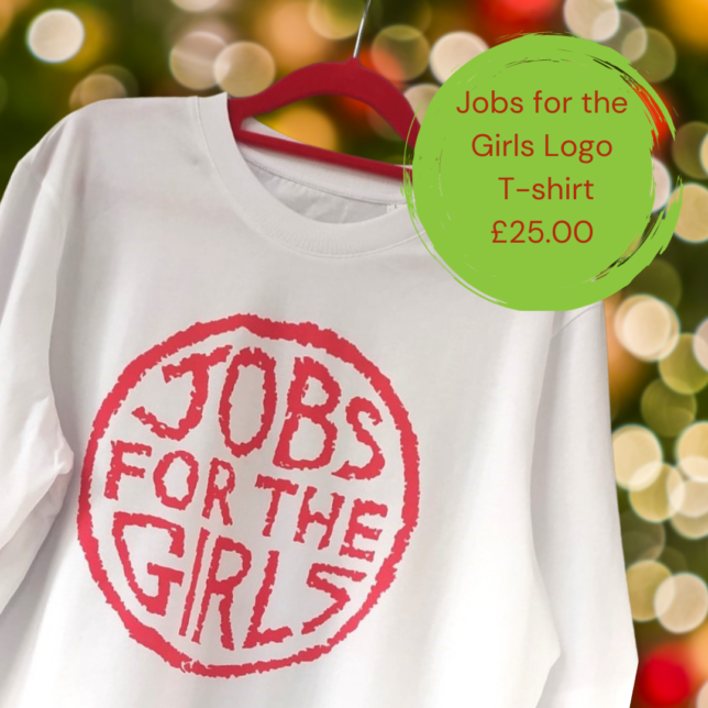 A white Tshirt with red text which reads Jobs For The GIrls. A green circle with red text is to the right, the text reads Jobs for the Girls Logo Tshirt £25