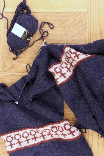 In progress image of the neckline of the Spare Rib jumper being knitted.
