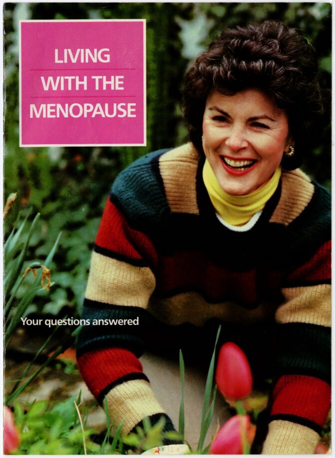 The front cover of the Living with the Menopause booklet. A middle-aged woman wearing a sweater is smiling and gardening.