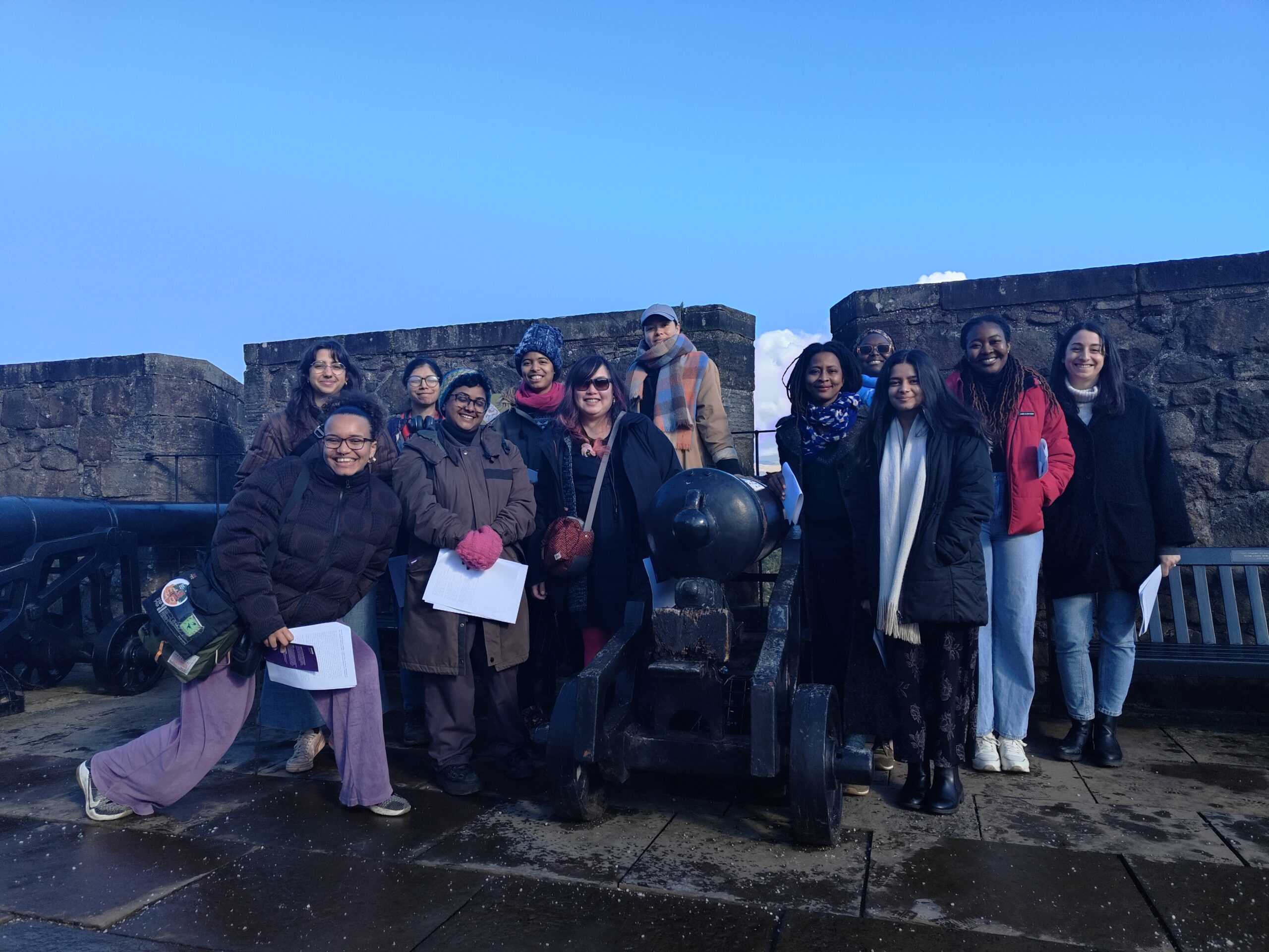 Twelve members of Readers of Colour gathered together in the same space.