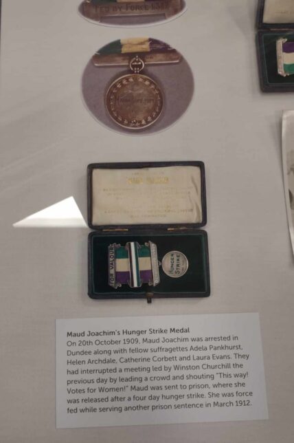 The medal awarded to Maud Joachim, on display in the GWL in a glass case.