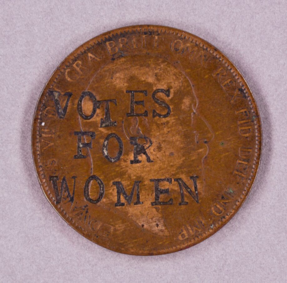 Penny with 'Votes For Women' stamped in capitals on the obverse, which bears the head of King Edward VII.