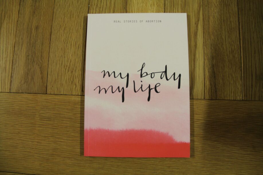 booklet about real abortion stories with the words "my body my choice" on it