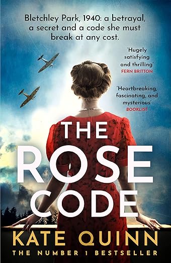 Book cover with a woman in 1940s dress with World War II planes overhead. Text reads 'The Rose Code - Kate Quinn' "Bletchley Park 1940: a betrayal, a secret, and a code she must break at any cost"