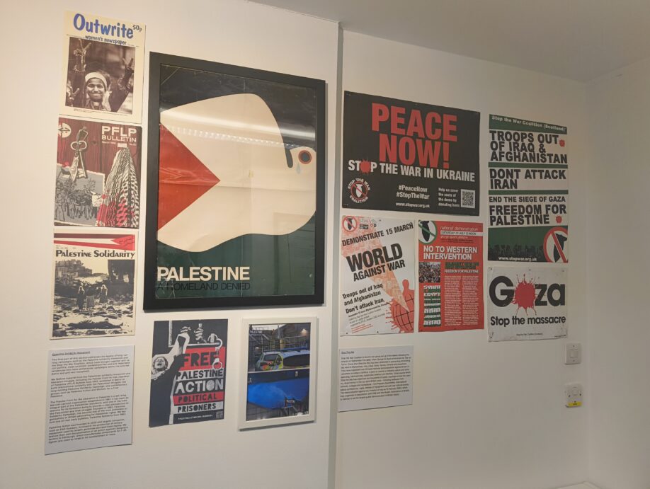 Exhibition section containing different posters and newspapers all advocating for peace in Palestine.