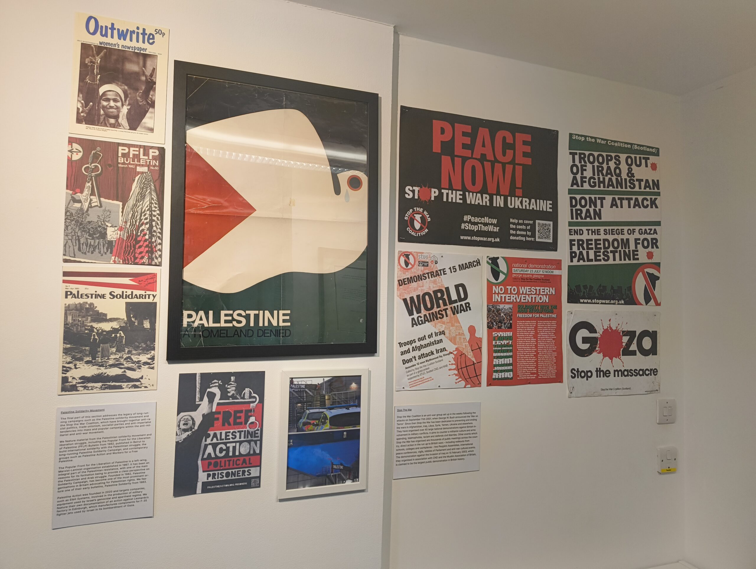 Exhibition section containing different posters and newspapers all advocating for peace in Palestine.