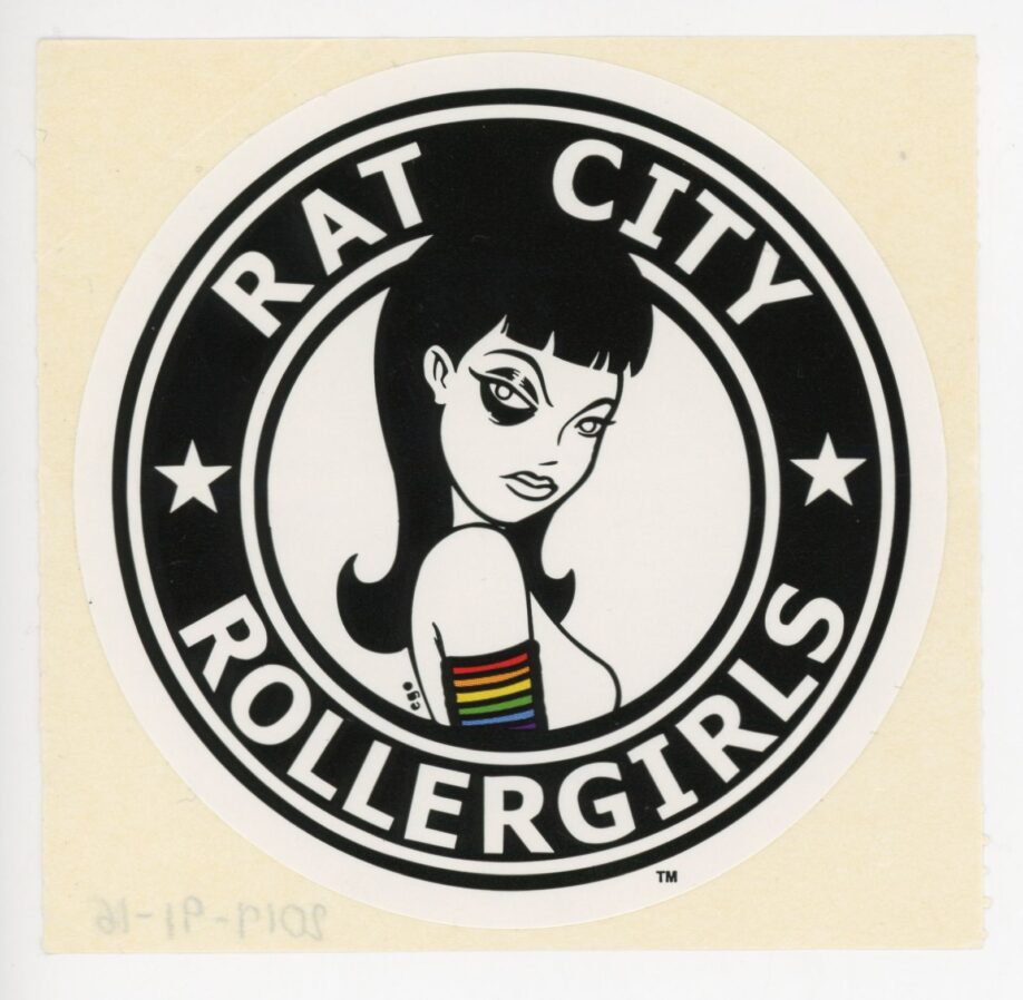 Round sticker on backing featuring the image of a woman turning her face to show a black eye, surrounded by the words 'Rat City Rollergirls' in a black edging band. She is also wearing a rainbow coloured armband.